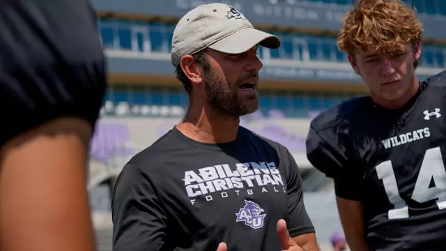 Graham Harrell talks to his quarterbacks after a scrimmage during fall camp on Aug. 15, 2026