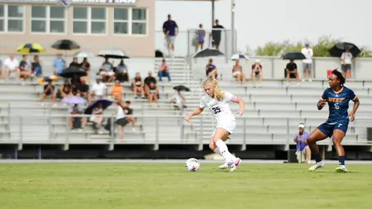 Baylie Simon dribbles past a defender in a game against UTEP on August 23, 2026.