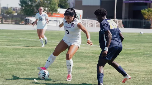 Mikayla Abrenica dribbling around an opponent against East Texas A&M on August. 30, 2026.