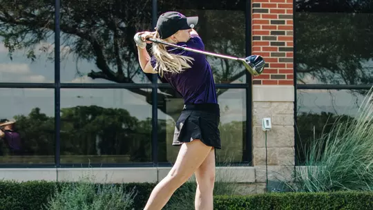 Kate Pickrell takes a swing at an ACU women's golf practice in Abilene, Texas on Sept. 11, 2025.