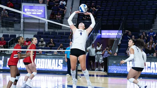 Rachel Koss sets an attack in ACU's 3-1 win over Lamar at Moody Coliseum on Aug. 28, 2026.