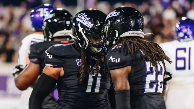 Darius Moore and Javeon Wilcox celebrate after a play against Stephen F. Austin on Sept. 12, 2026