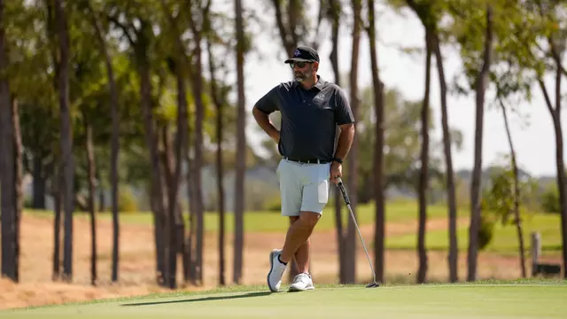 Chance Cain analyzes the course at Halbert National in Granbury, Texas.