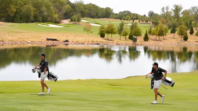 Luis Buech and Kade McDonough walk the course at Halbert National in Granbury, Texas.