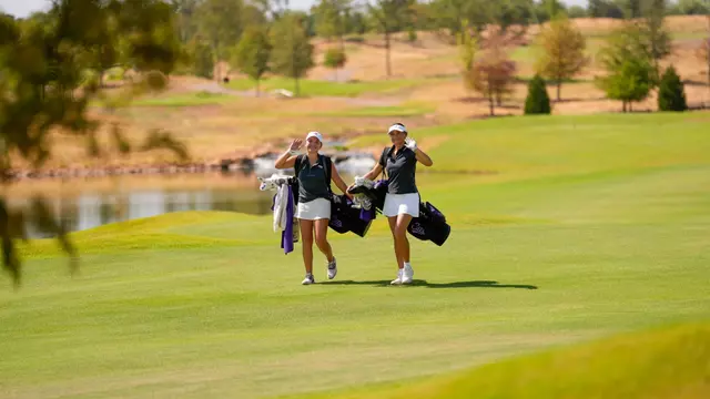 Alana Kutt and Julia Vollmer walk the course at Halbert National in Granbury, Texas.