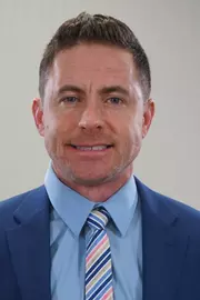 Dr. Tim Sykes