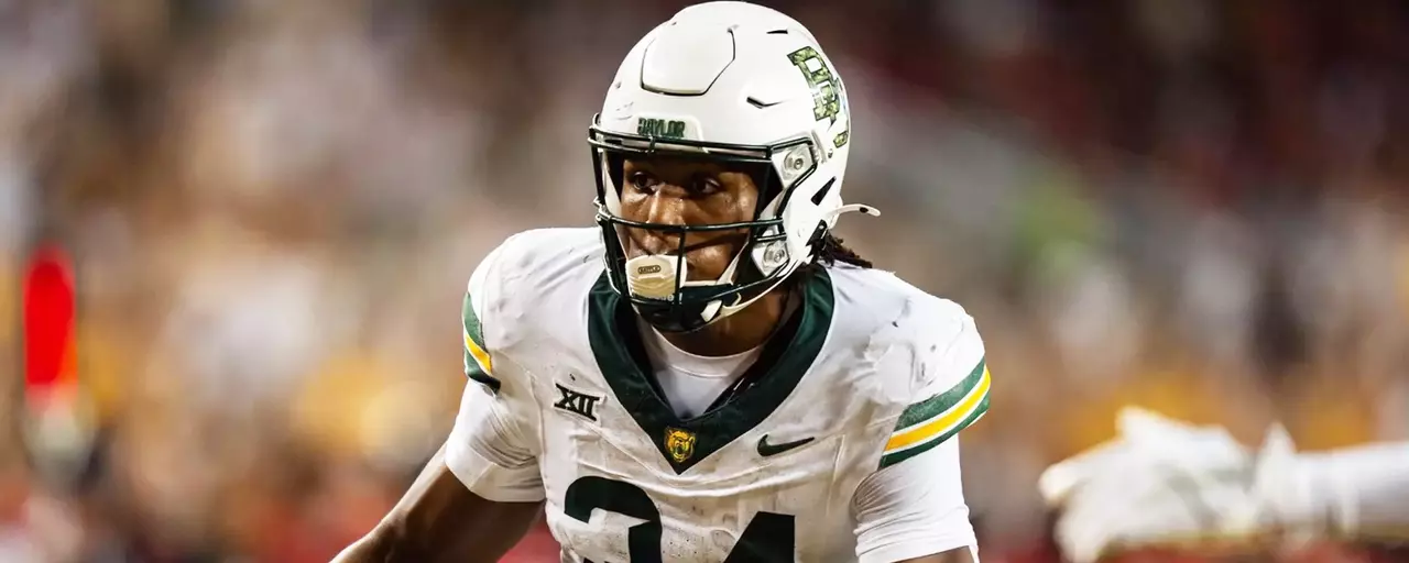 Josh Cameron returns a punt during Baylor football's game against Utah