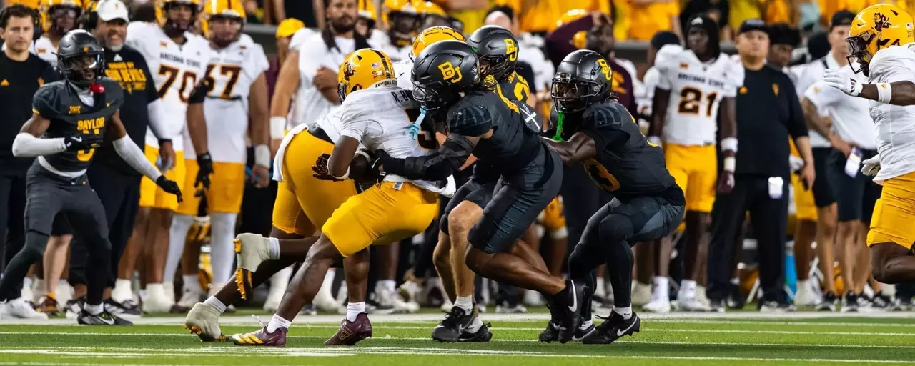 Football vs. Arizona State Defense Action Shot
