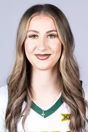 Ines Goryanova headshot in white uniform in front of white backdrop