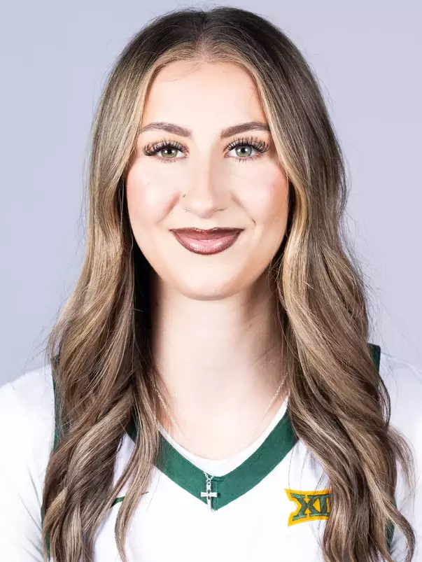 Ines Goryanova headshot in white uniform in front of white backdrop