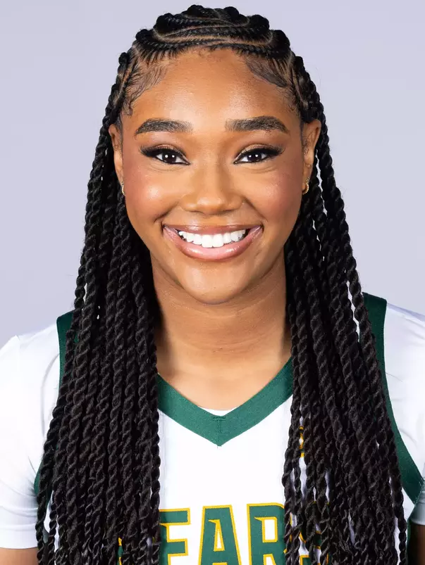 Marcayla Johnson headshot in white uniform in front of white backdrop