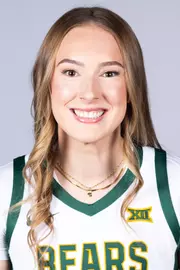 Ella Brow headshot in white uniform in front of white backdrop