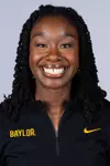 Juliana Smith 2026 Headshot in black pullover and white backdrop