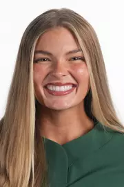 Gigi Lindsey 2026-27 Headshot in front of a white backdrop