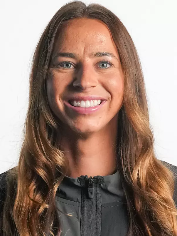 Presleigh Pilon Headshot in front of a white backdrop