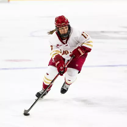 Olivia Maffeo with puck vs Holy Cross