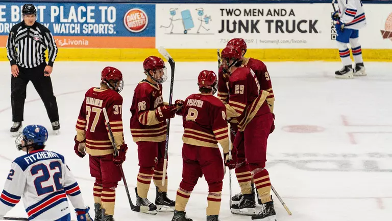 Men's Hockey celebrating goal against USNTDP