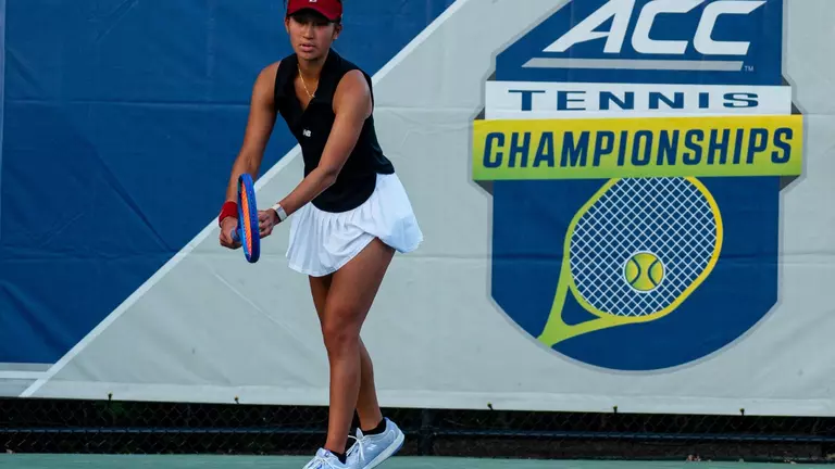 Bella Camacho serve
