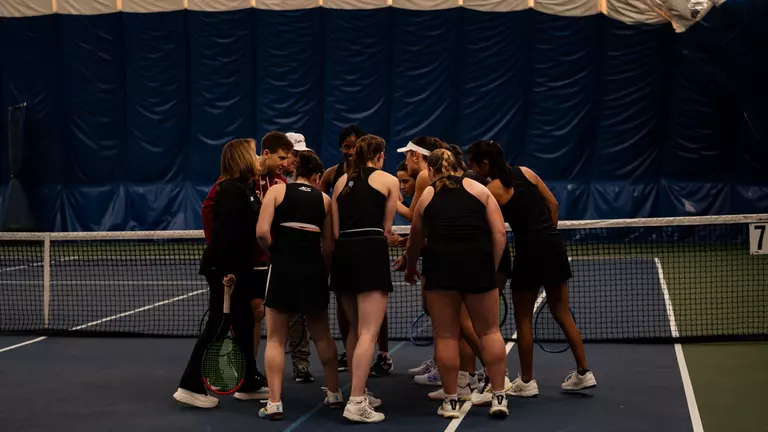 Women's Tennis Group huddle
