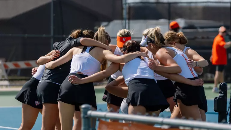 Falcon Tennis Tamed By the Huskies