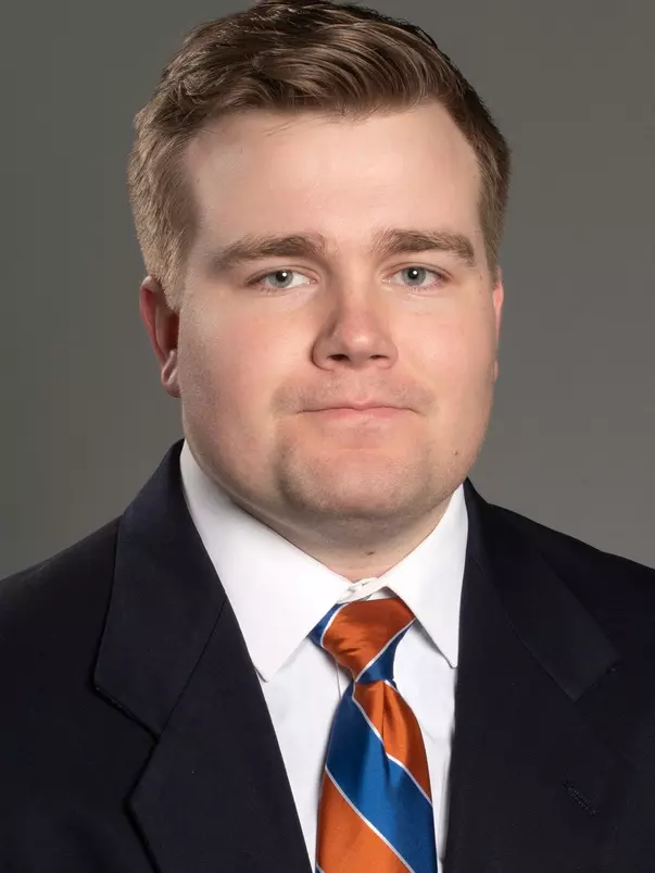 Mobile Studio with Athletics staff and Football, portrait by Priscilla Grover