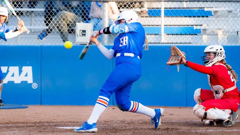 Broncos Edged by Rebels