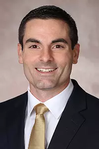 head shot of football assistant coach Michael Donovan in professional dress