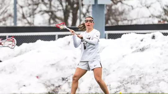 Tessie Batchelder with the ball in her stick against Cornell (Mar. 7, 2026)