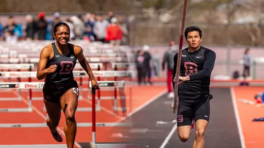 Simone Dunbar and Gabe Thai compete at UMass in April 2026