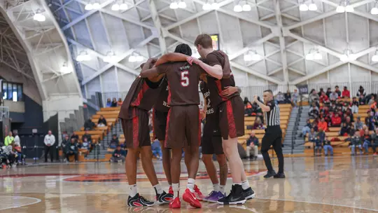 Men's Basketball Huddle at Princeton