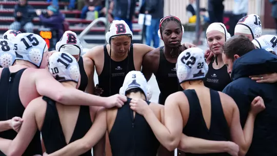 Women's water polo team huddle