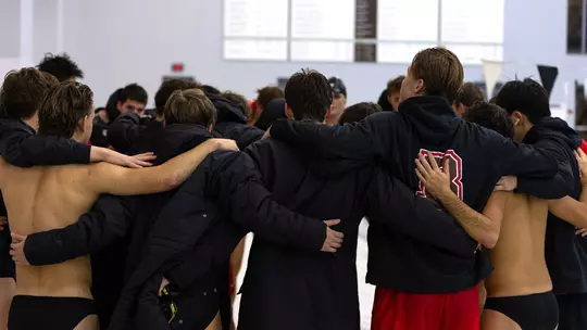 Men's Swim & Dive Huddle Against Yale