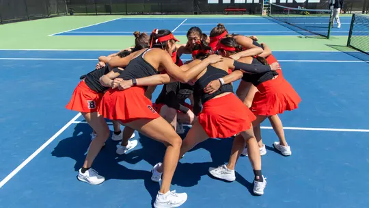 Women's Tennis Team Huddle