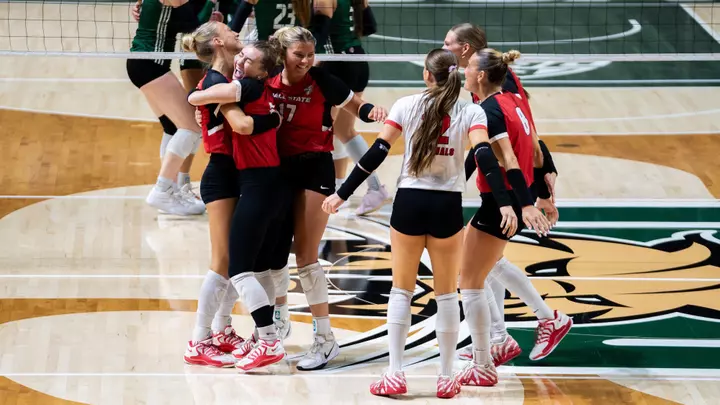 The Ball State women's volleyball team celebrates a point in the Oct. 17 victory at Ohio