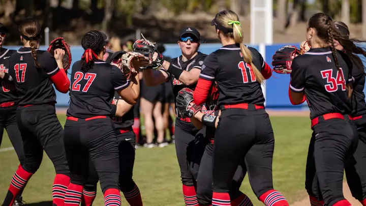 Ball State team high five line
