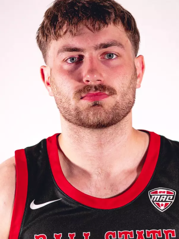 Joey Hart headshot featuring Hart in a black Ball State basketball jersey