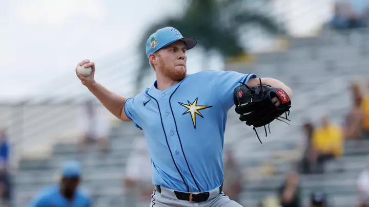 Ty Johnson in a Tampa Bay Rays uniform throwing a pitch