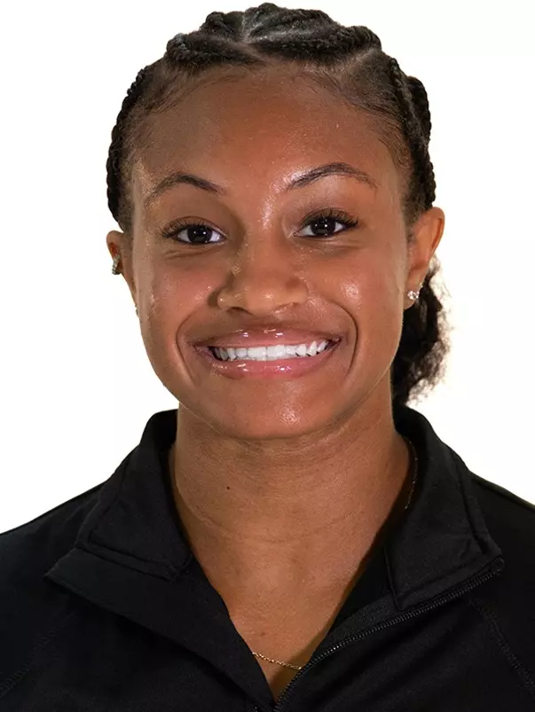 Headshot Featuring Mackenzie Showers in a Black Ball State Shirt