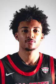 Zaon Collins headshot with Collins in a black Ball State basketball jersey