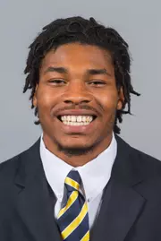 15FB Powell_Lonny suit mug 800x640