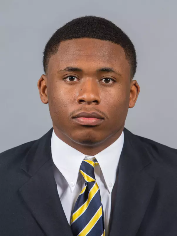 15FB Strickland_Carlos suit mug 800x640