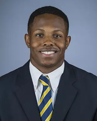 2016 Derron Brown Coat And Tie Head Shot