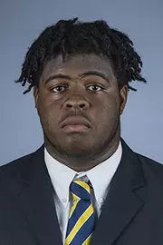 2016 Dwayne Wallace Coat And Tie Head Shot