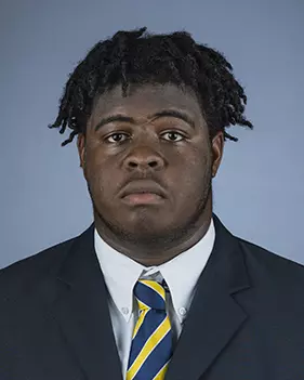2016 Dwayne Wallace Coat And Tie Head Shot