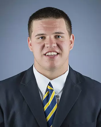 2016 Henry Bazakas Coat And Tie Head Shot