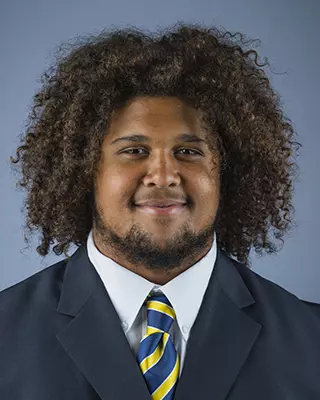 2016 James Looney Coat And Tie Head Shot