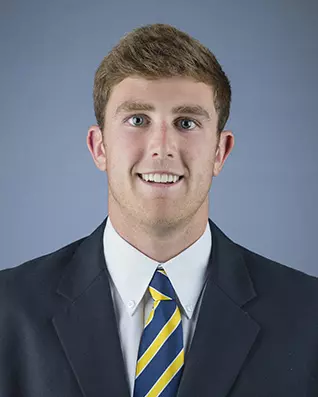 2016 Justin Dunn Coat And Tie Head Shot