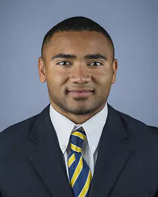 2016 Khalfani Muhammad Coat And Tie Head Shot