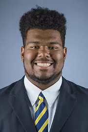 2016 Malik McMorris Coat And Tie Head Shot