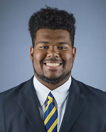 2016 Malik McMorris Coat And Tie Head Shot